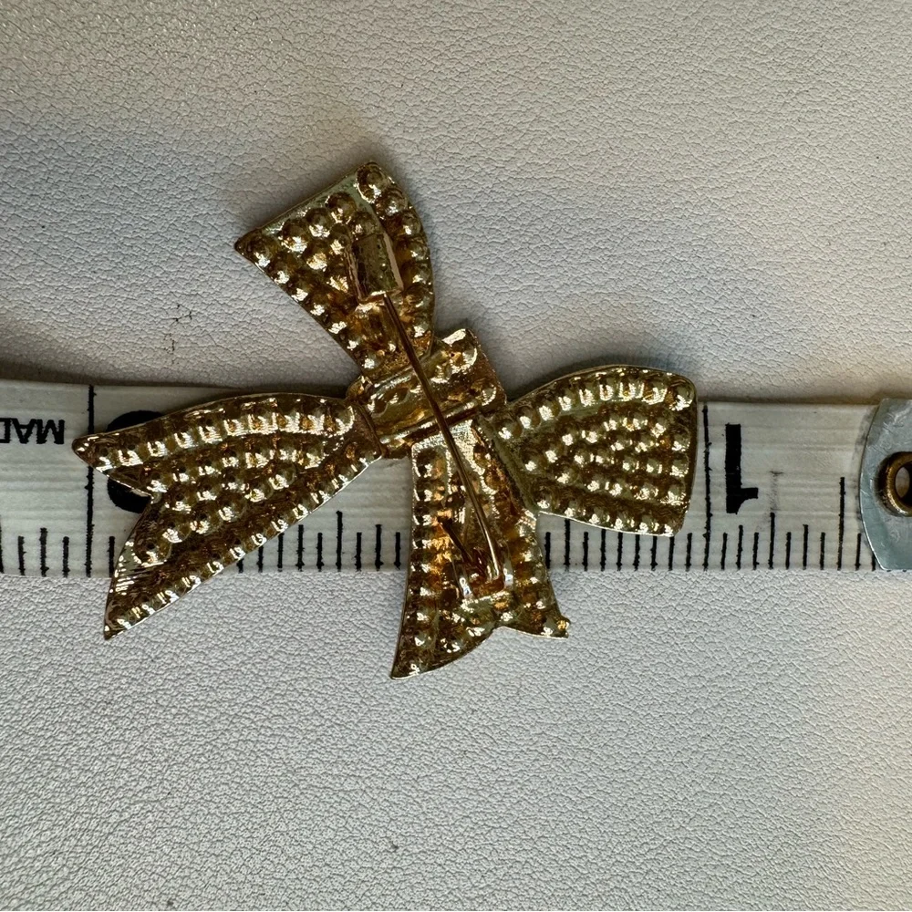 Elegant Gold and Teal Bow Brooch